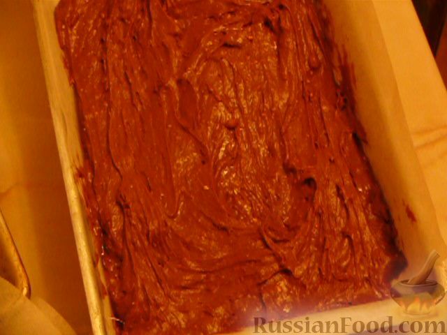 Фото приготовления рецепта: Шоколадно-апельсиновый кекс с орехами - шаг №8