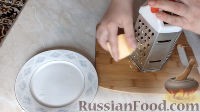 Фото приготовления рецепта: Кабачки с сыром и сметаной, запеченные в духовке - шаг №8