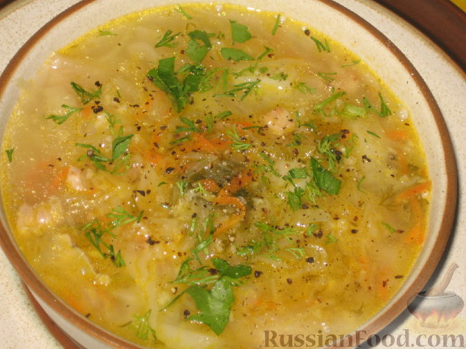 Фото приготовления рецепта: Рисовый суп с капустой и сыром - шаг №7