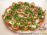 Фото к рецепту: Закуска из кабачков с чесноком и помидорами
