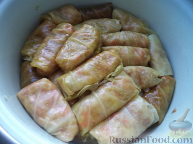 Фото приготовления рецепта: Рыбные тефтельки в томатном соусе - шаг №15