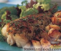 Фото к рецепту: Морская рыба, запеченная с картофелем в духовке