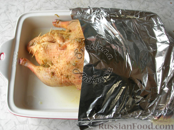 Фото приготовления рецепта: Сочная утка, запеченная с апельсинами - шаг №5