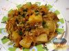 Фото к рецепту: Тушеная  кислая капуста с картофелем