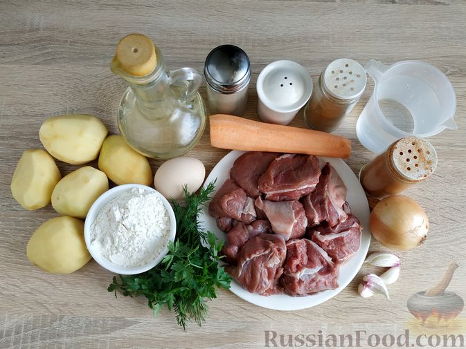 Фото приготовления рецепта: Мясо, тушенное с картофелем и галушками с зеленью и чесноком - шаг №1