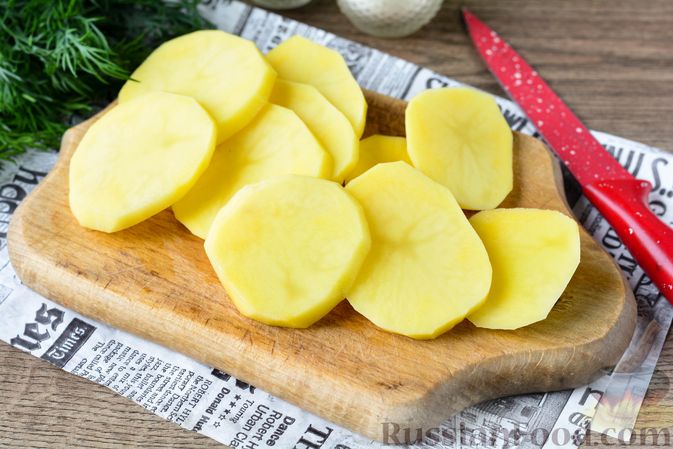 Фото приготовления рецепта: Рыба, запечённая с картошкой и лимоном (в фольге) - шаг №2