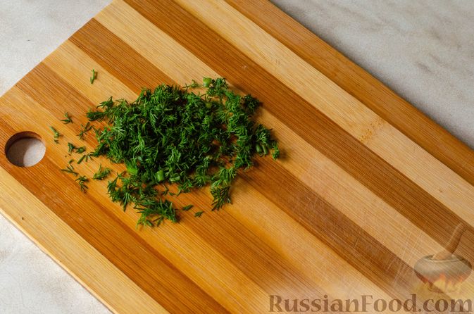 Фото приготовления рецепта: Картофель с оливками, запечённый в сливках - шаг №7