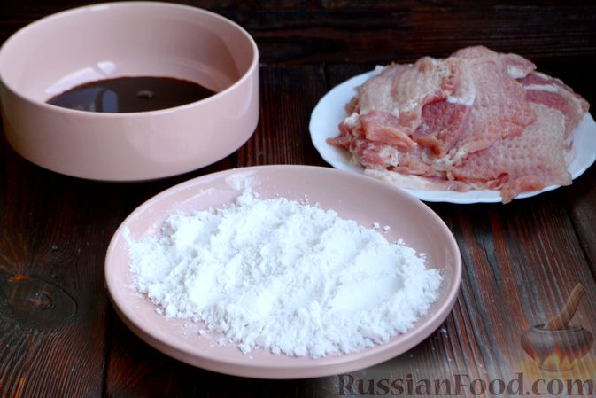 Фото приготовления рецепта: Свиные отбивные в соевом соусе - шаг №5