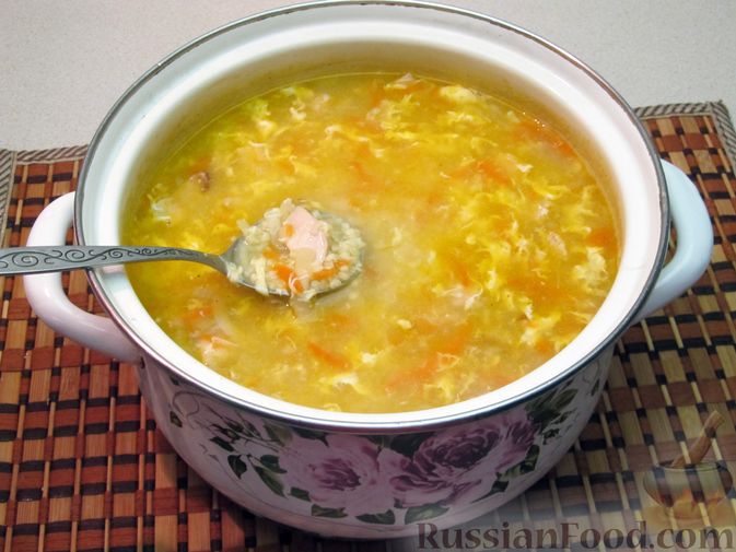 Фото приготовления рецепта: Суп с курицей, лапшой, пшеном и беконом - шаг №16