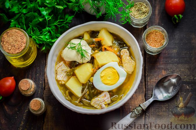 Фото приготовления рецепта: Куриный суп с морской капустой и консервированным горошком - шаг №15