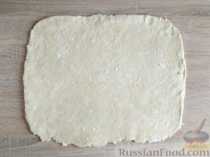 Фото приготовления рецепта: Ленивые пирожки "Улитки" из творожного теста, с мясным фаршем - шаг №10