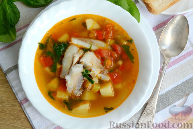 Фото приготовления рецепта: Рыбный суп со шпинатом и овощами - шаг №18