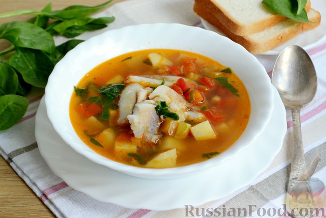 Фото приготовления рецепта: Рыбный суп со шпинатом и овощами - шаг №19
