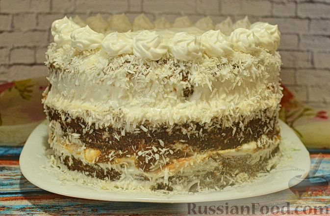 Фото приготовления рецепта: Пряный торт с сухофруктами, сгущёнкой и сливочно-сырным кремом - шаг №19