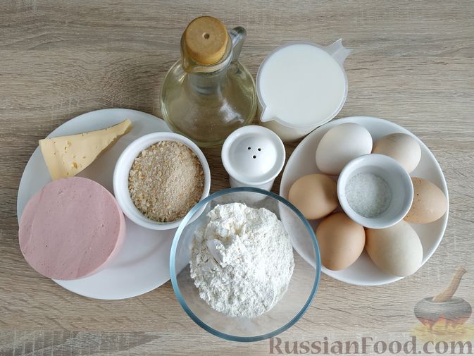 Фото приготовления рецепта: Блины с колбасой, сыром и варёными яйцами (в панировке) - шаг №1