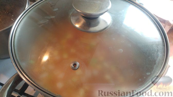 Фото приготовления рецепта: Суп с фрикадельками, овощами и перловой крупой (на курином бульоне) - шаг №22
