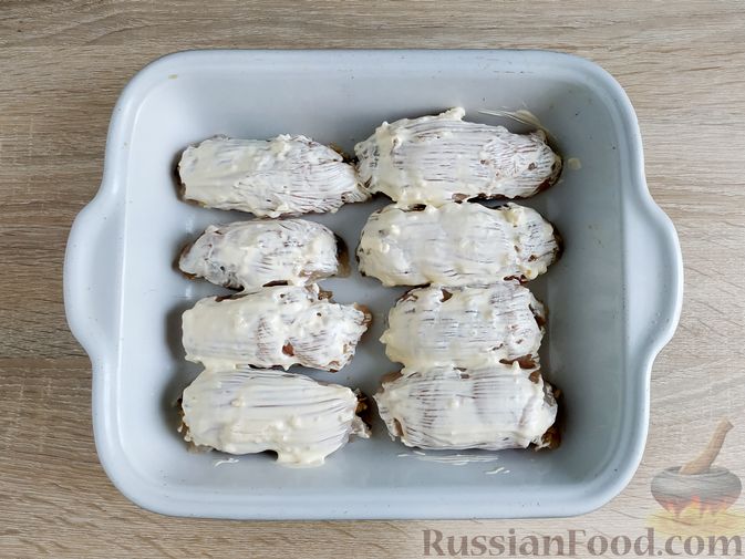 Фото приготовления рецепта: Куриные рулетики с грибами, маслинами и сыром (в духовке) - шаг №19