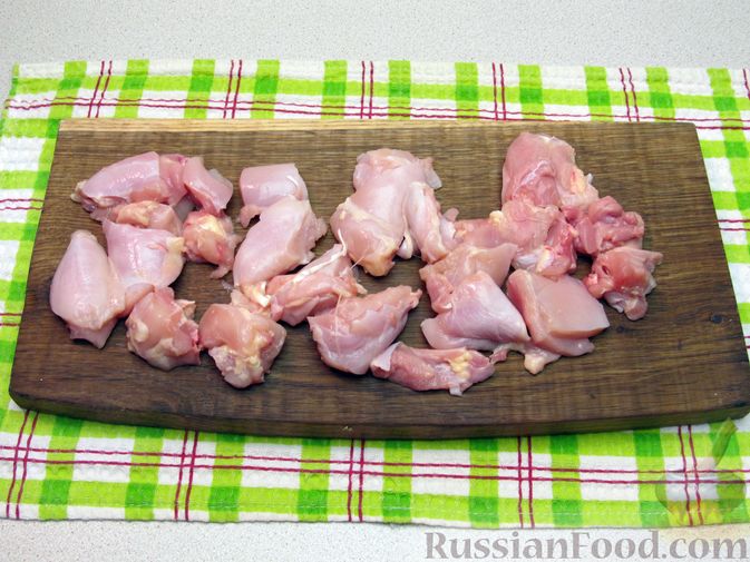 Фото приготовления рецепта: Рис с курицей, морковью и луком (на сковороде) - шаг №9