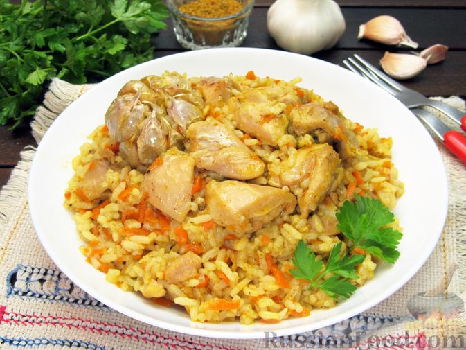 Фото приготовления рецепта: Рис с курицей, морковью и луком (на сковороде) - шаг №17
