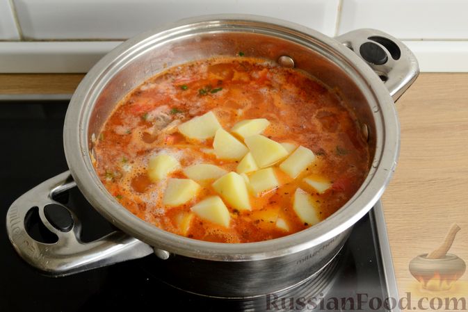 Фото приготовления рецепта: Суп из телятины с овощами - шаг №13