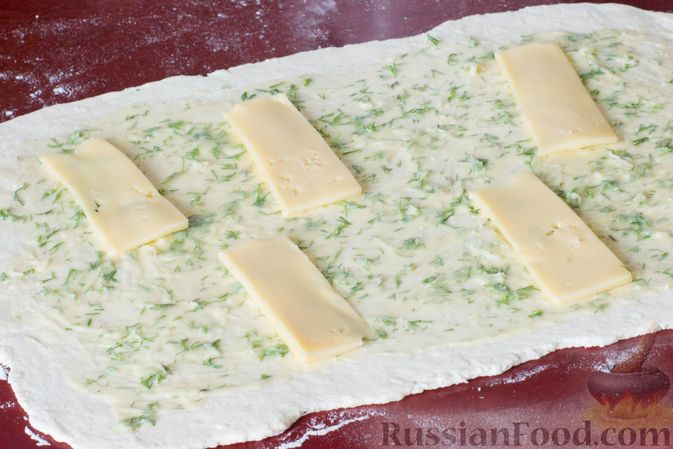 Фото приготовления рецепта: Творожные булочки с чесноком и сыром - шаг №9