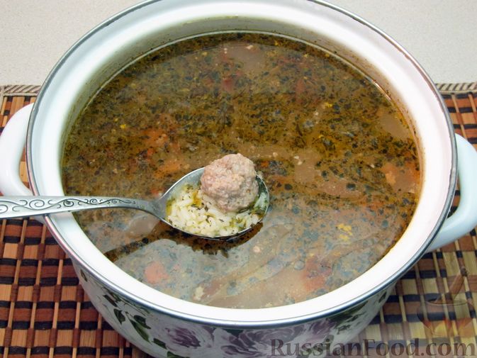 Фото приготовления рецепта: Суп с рисом и фрикадельками - шаг №15