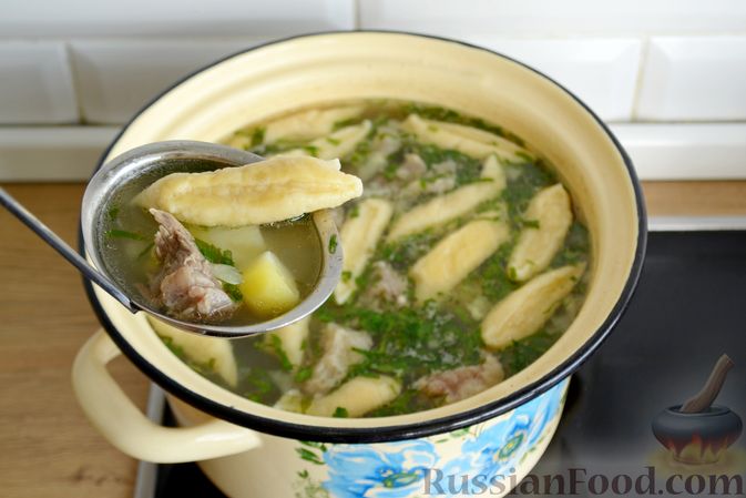 Фото приготовления рецепта: Суп с галушками - шаг №15
