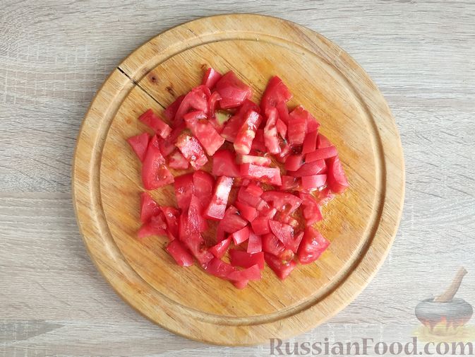 Фото приготовления рецепта: Кабачки, тушенные с мясным фаршем и помидорами - шаг №9