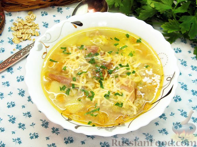 Фото к рецепту: Куриный суп с овсяными хлопьями