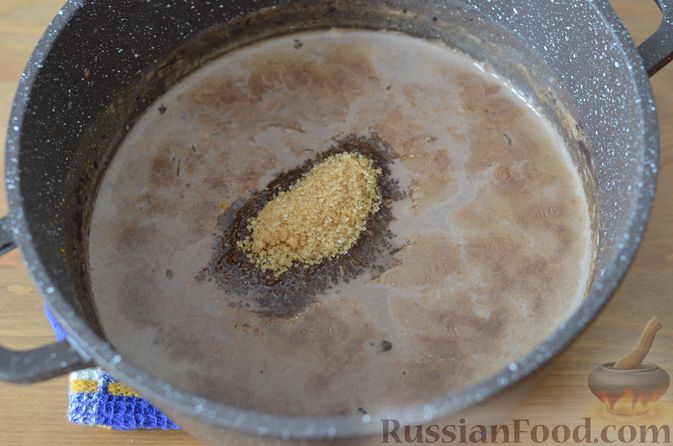 Фото приготовления рецепта: Шоколадная рисовая каша на молоке, с апельсином - шаг №6