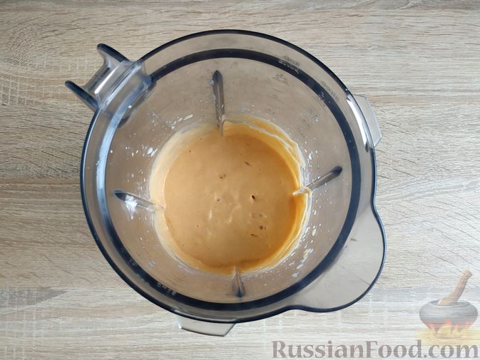 Фото приготовления рецепта: Абрикосовый смузи с апельсином и мороженым - шаг №9