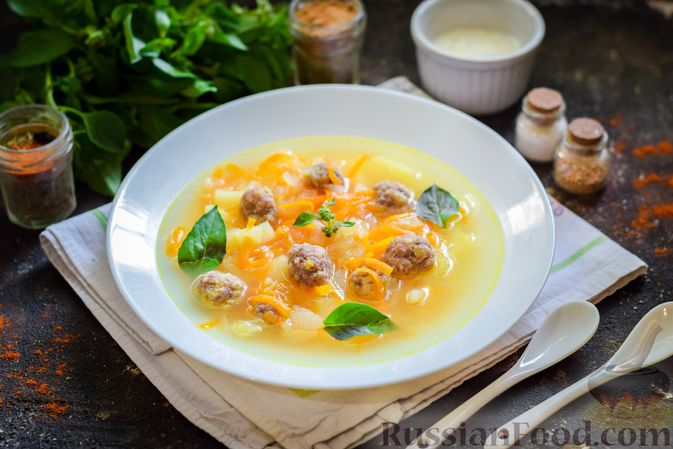 Фото приготовления рецепта: Суп с фрикадельками, картофелем и капустой - шаг №13