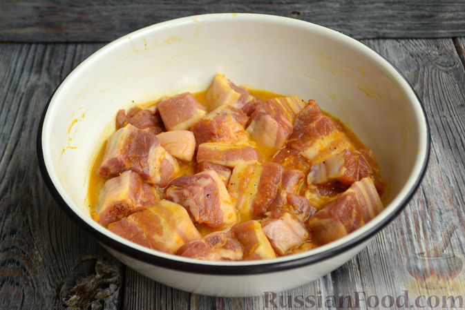 Фото приготовления рецепта: Свиные рёбрышки в апельсиновом маринаде (в духовке) - шаг №7
