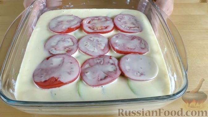Фото приготовления рецепта: Запеканка с кабачками, куриным фаршем, помидорами и сыром - шаг №10