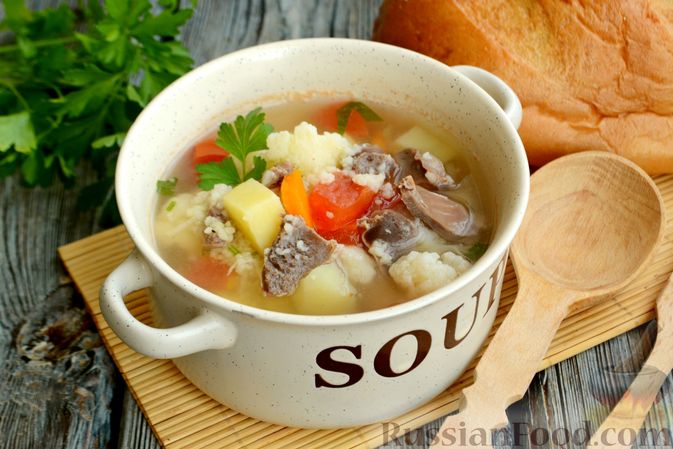 Фото приготовления рецепта: Куриный суп с цветной капустой и кускусом - шаг №14