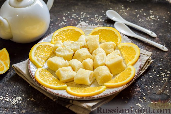 Фото к рецепту: Ленивые вареники из творога с апельсином