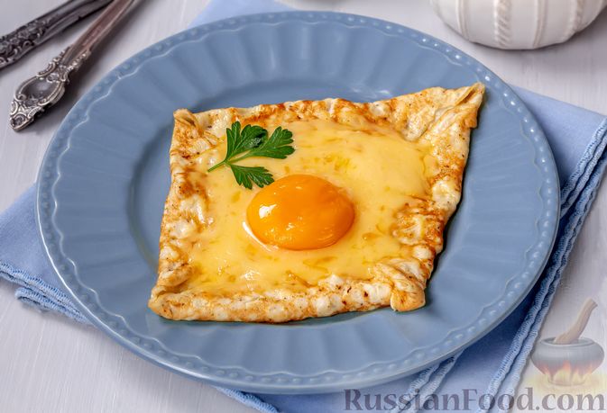 Фото к рецепту: Яичный блинчик с сыром