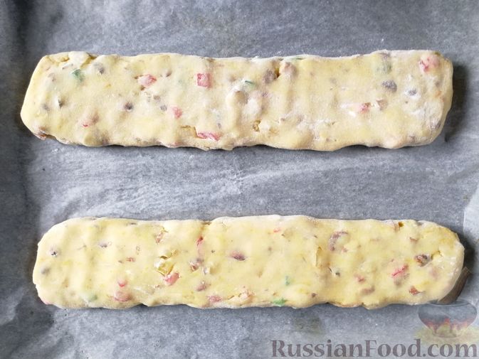 Фото приготовления рецепта: Печенье кантучини с орехами и цукатами - шаг №9
