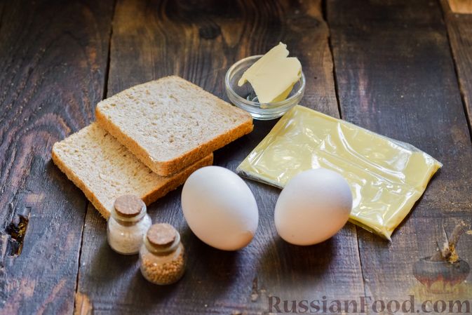 Фото приготовления рецепта: Сэндвич с яйцом и сыром - шаг №1