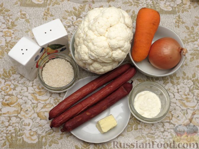 Фото приготовления рецепта: Суп с цветной капустой, рисом и сосисками - шаг №1