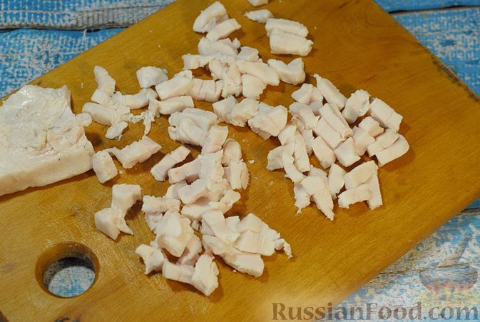 Фото приготовления рецепта: Свиные рёбрышки, запечённые с фасолью и хлебом (кассуле) - шаг №4