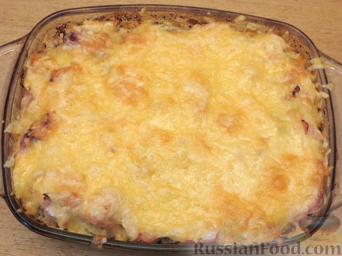 Фото приготовления рецепта: Гречка с куриным филе и сыром, в духовке - шаг №10