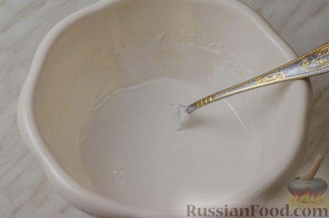 Фото приготовления рецепта: Апельсиновый кекс с клюквой и белковой глазурью - шаг №17
