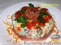 Фото к рецепту: Салат с семгой, апельсинами и оливками