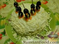 Фото к рецепту: Салат "Пингвины на льдине"