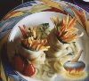 Фото к рецепту: Рыбные рулеты, фаршированные овощами