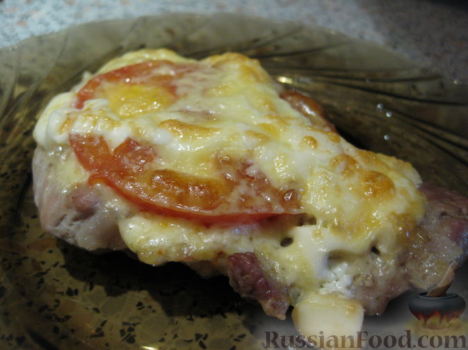 Рецепт Свинина, запеченная под сыром с помидорами