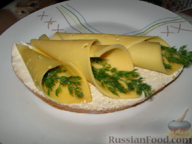 Рецепт Бутерброды с кулёчками из сыра и зелени.