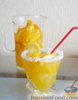 Фото к рецепту: Апельсиновый лимонад / Безалкогольный крюшон