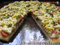 Фото к рецепту: Пицца с ветчиной, томатами и яйцом